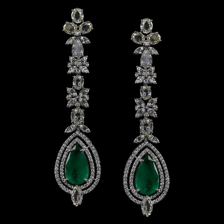 Emerald drop earrings by Huma Jewellers