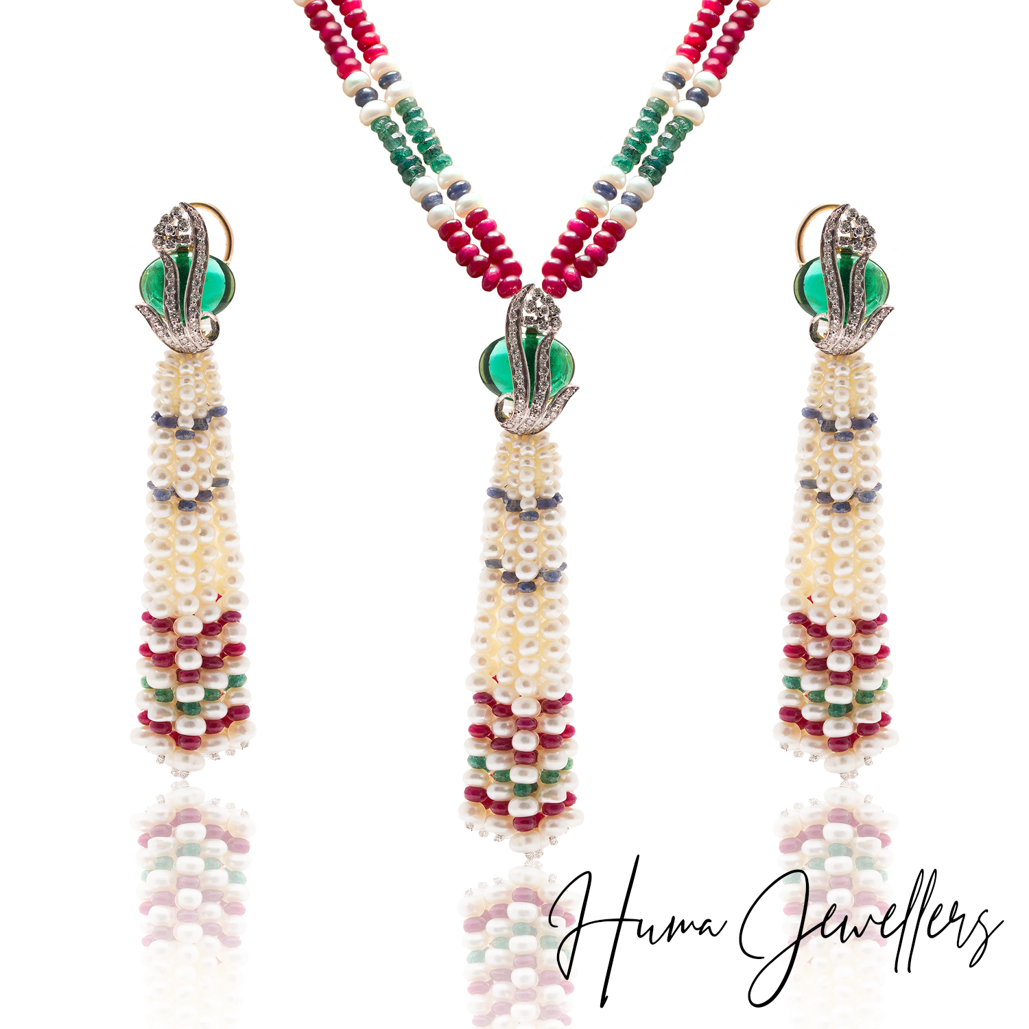 modern spirals dangling locket pendant necklace set with diamonds ruby emeralds natural pearls at huma jewellers jewelry karachi pakistan