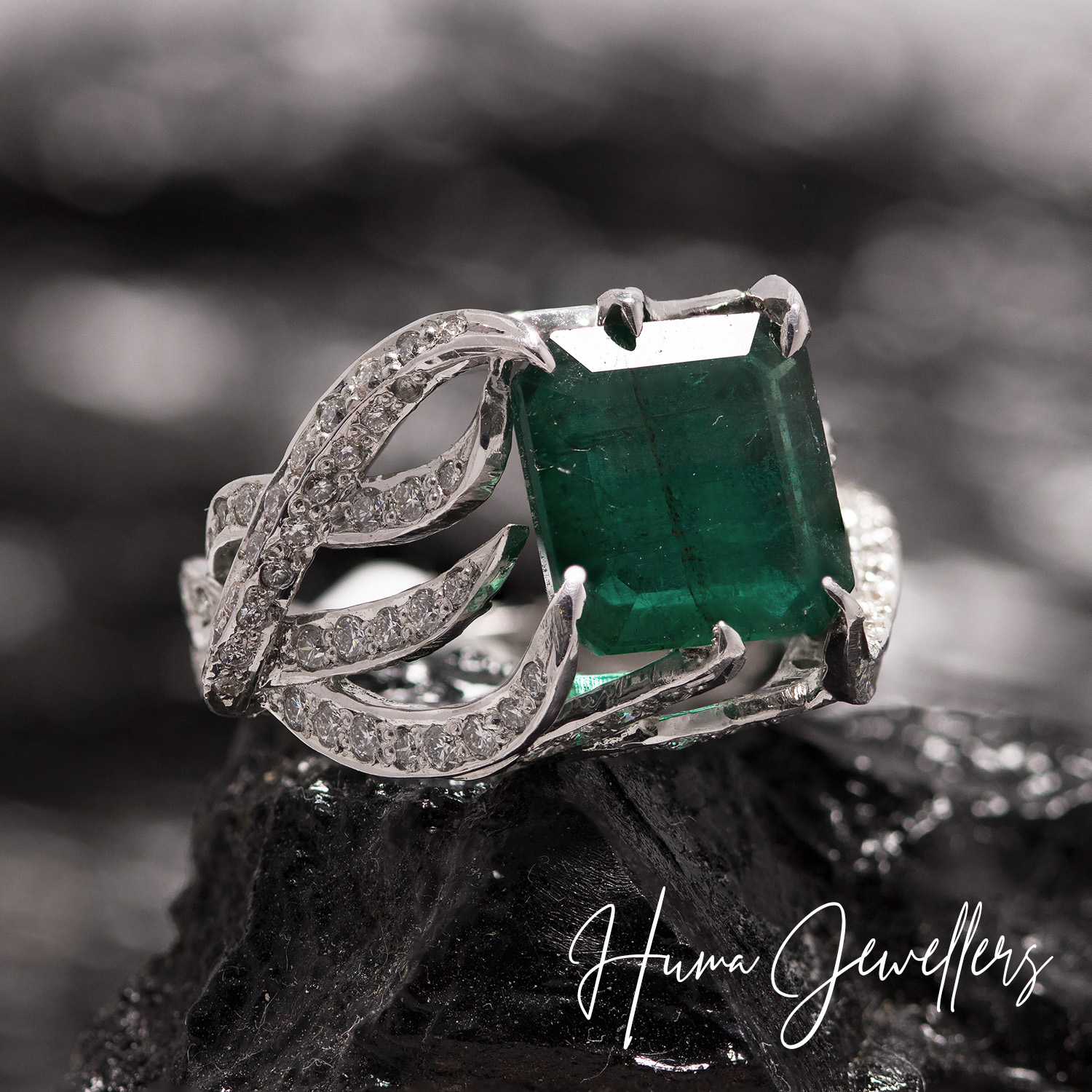 modern women diamond ring design with zambian emerald by huma jewellers jewelry karachi pakistan