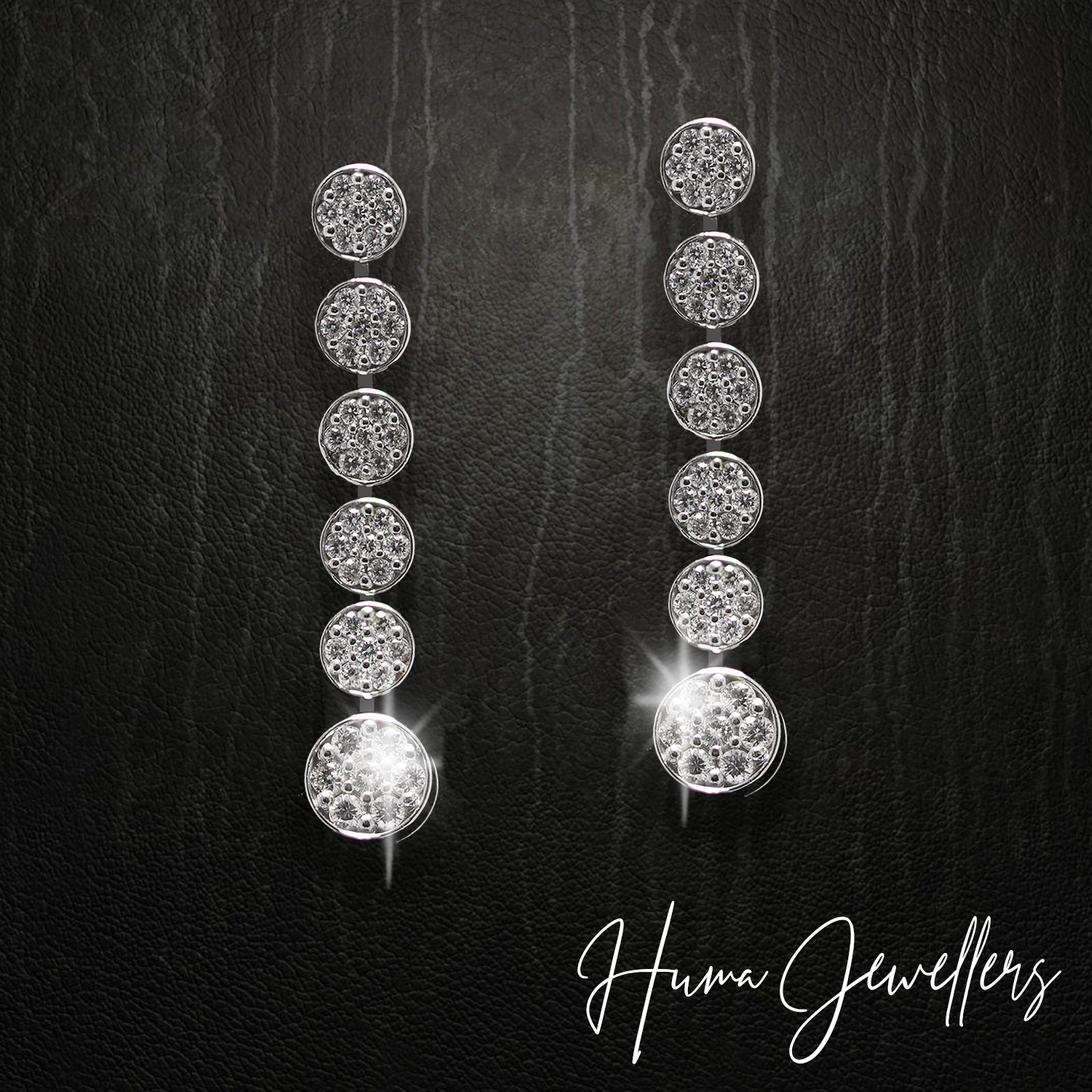 modern diamond earrings design with illusion setting in huma jewellers karachi pakistan