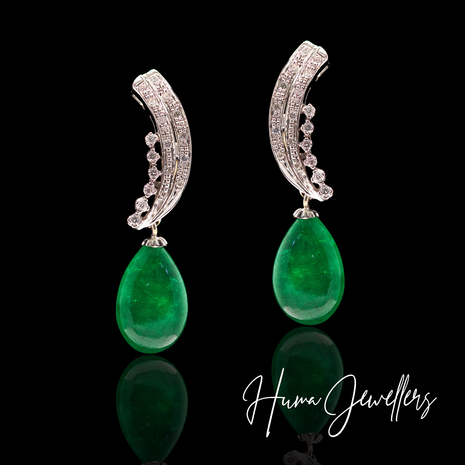 diamond half moon shaped earring tops design with green stone by huma jewellers karachi pakistan