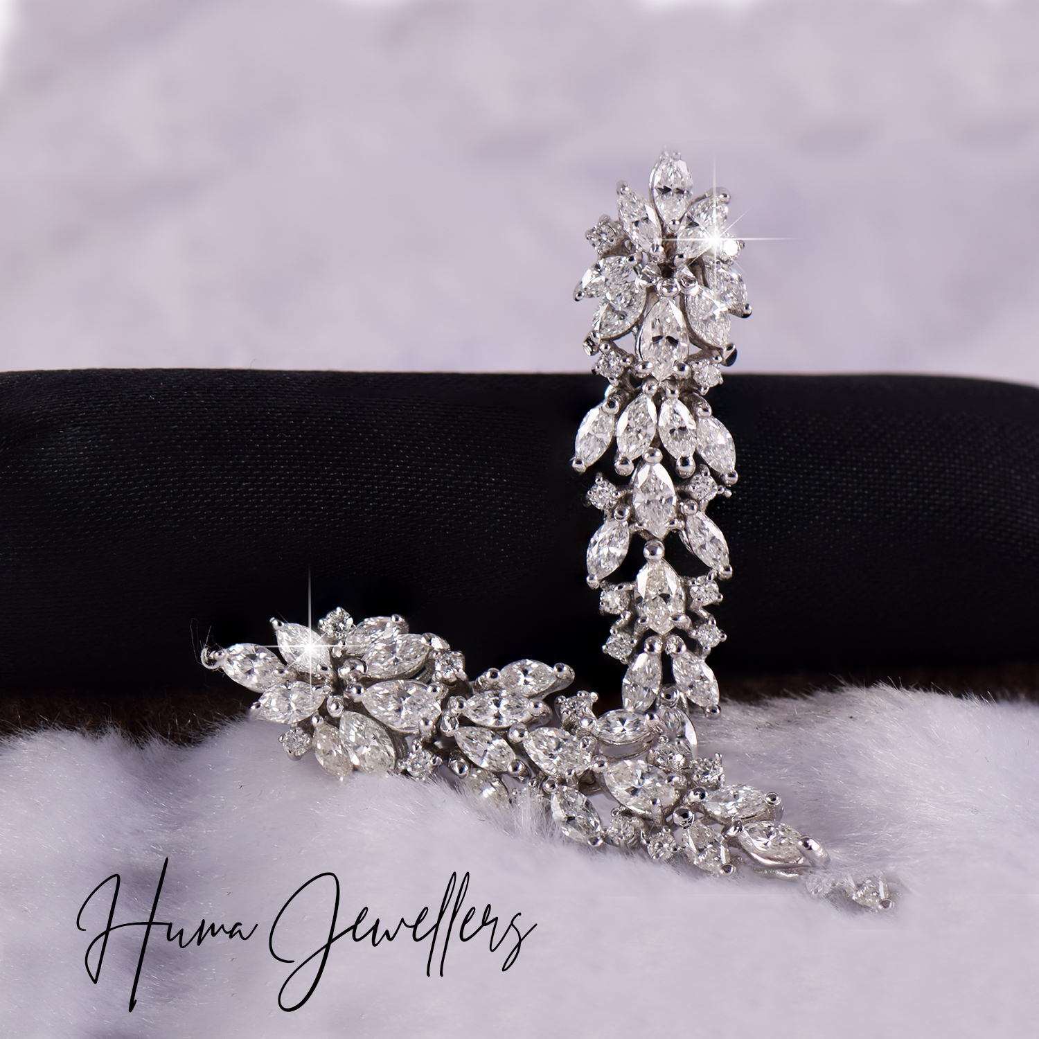 marquise fancy shaped diamond earring design with round diamonds in 18 karat gold by huma jewellers karachi pakistan
